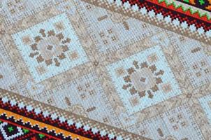 traditionell ukrainska folk konst stickat broderi mönster på textil- tyg foto