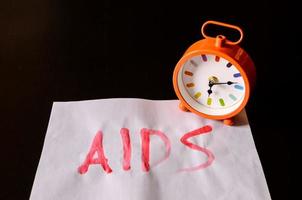 AIDS och klocka foto