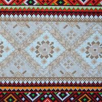 traditionell ukrainska folk konst stickat broderi mönster på textil- tyg foto