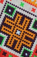 traditionell ukrainska folk konst stickat broderi mönster på textil- tyg foto