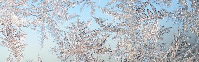 snöflingor frost rimfrost makro på fönster glas Ruta foto