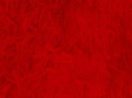 röd rena ull textur bakgrund. ljus naturlig får ull. röd sömlös bomull. textur av fluffig päls för designers jul dag. närbild fragment röd ull matta.. foto