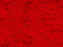 sömlös textur av röd cement vägg en grov yta, med Plats för text, för en bakgrund. foto