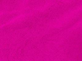 rosa rena ull textur bakgrund. ljus naturlig får ull. rosa sömlös bomull. textur av fluffig päls för designers. närbild fragment vit ull matta.för valentine foto