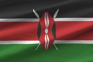 kenya flagga med stor veck vinka stänga upp under de studio ljus inomhus. de officiell symboler och färger i baner foto