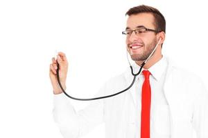läkare med stetoskop foto