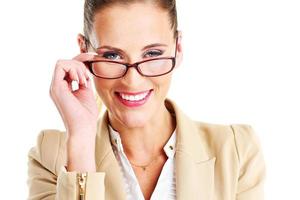 glad affärskvinna bär glasögon foto