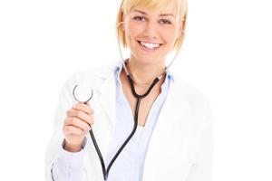 Lycklig läkare med stetoskop foto