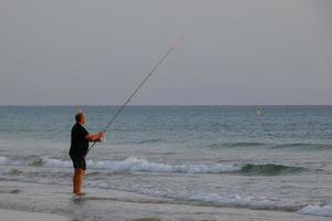 strand Strand fiske, traditionell fiske som en hobby foto