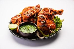 tandoori kyckling är ett indisk icke vegetarian kryddad mat foto