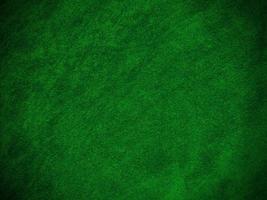 mörk grön gammal sammet tyg textur Begagnade som bakgrund. tömma grön tyg bakgrund av mjuk och slät textil- material. där är Plats för text... foto