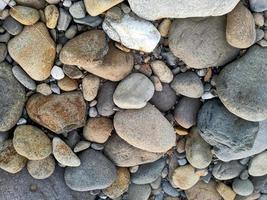 naturlig sten från de flod med en hård textur Bra för byggnad material foto