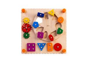 trä- eco vänlig upptagen styrelse pedagogisk leksak för barn foto