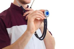 närbild porträtt av en läkare med stetoskop foto