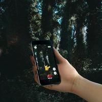 iphone 6s med pokemon gå app foto