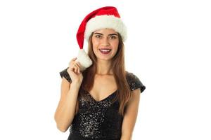 Lycklig sötnos flicka i santa hatt foto