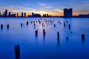 ny jersey horisont på solnedgång från manhattan, ny york stad över de hudson flod. foto