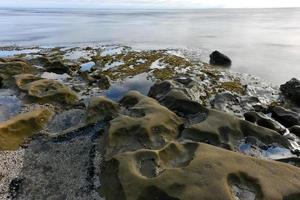 solnedgång på de tidvatten pooler i la jolla, san diego, Kalifornien. foto