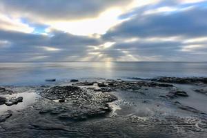 solnedgång på de tidvatten pooler i la jolla, san diego, Kalifornien. foto