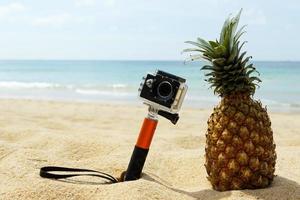 ananas och actionkamera foto
