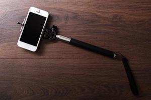 smart telefon och selfie pinne foto