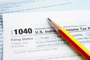 skatteblankett 1040 us individuell inkomstdeklaration, företagsekonomikoncept. foto