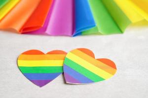 HBTQ text karaktär med regnbåge flagga hjärta för symbol av stolthet månad lesbisk, Gay, bisexuell, transpersoner, mänsklig rättigheter, tolerans och fred. foto