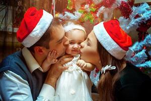 först jul med liten bebis flicka foto