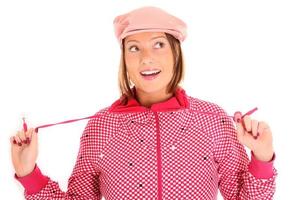 kvinna med rosa hatt foto
