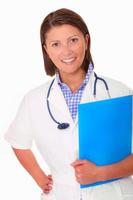 kvinnlig läkare med stetoskop foto