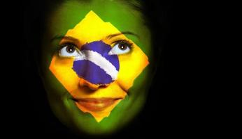 brasiliansk flagga ansikte målning foto