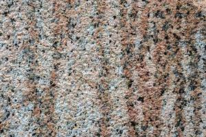 granit sten vägg textur i en detaljerad stänga upp se i en hög upplösning. foto