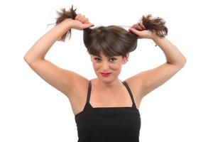Söt flicka oro handla om hår förlust. problem med hår begrepp foto