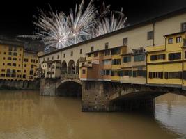 ponte vecchio bro florens brand Arbetar på natt foto