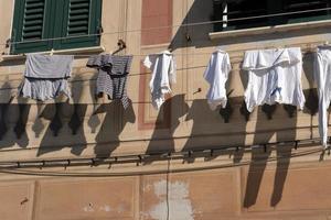 camogli hus kläder torkning till de Sol foto