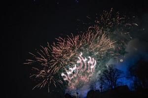 ljubljana slott Lycklig ny år fyrverkeri foto