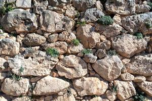 abstrakt mönster gammal årgång vägg naturlig sten foto