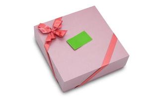 gåva låda med band rosett och papper märka, isolerat på vit foto