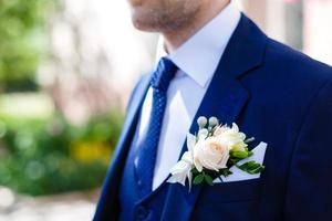 boutonniere för de brudgum, brudgum stil foto