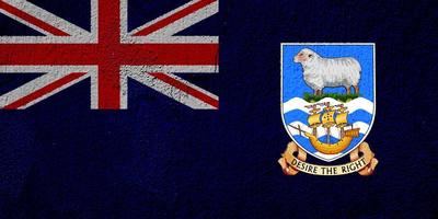 flagga av de falkland öar på en texturerad bakgrund. begrepp collage. foto