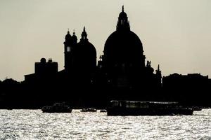 Venedig stadsbild silhuett på solnedgång foto