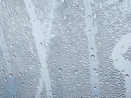regndroppar på glas oskärpa bakgrund regnperiod koncept, väderprognos meteorologisk avdelning väder dålig sikt kallt väder sova att sova foto