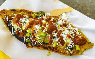 mexikansk mat tlakobananer tlakojos av banan deg kryddad sås Mexiko. foto