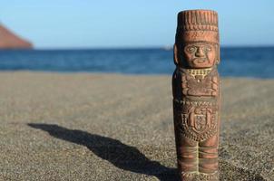 små staty i de sand foto