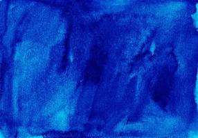 vattenfärg flytande mörk azurblå blå bakgrund målning textur. årgång indigo blå Färg. fläckar på papper. foto