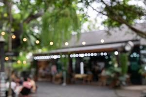 fläck kaffe affär eller Kafé restaurang med abstrakt bokeh ljus bild bakgrund. foto