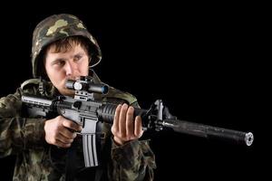 siktar soldat med en gevär foto