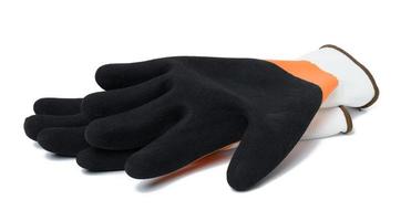 stickat handskar med latex beläggning till skydda mot mekanisk skada, fett och olja foto
