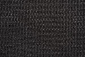 svart nylon tyg texturerad bakgrund med sexkantig form