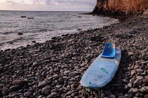 surfingbräda på de Strand foto